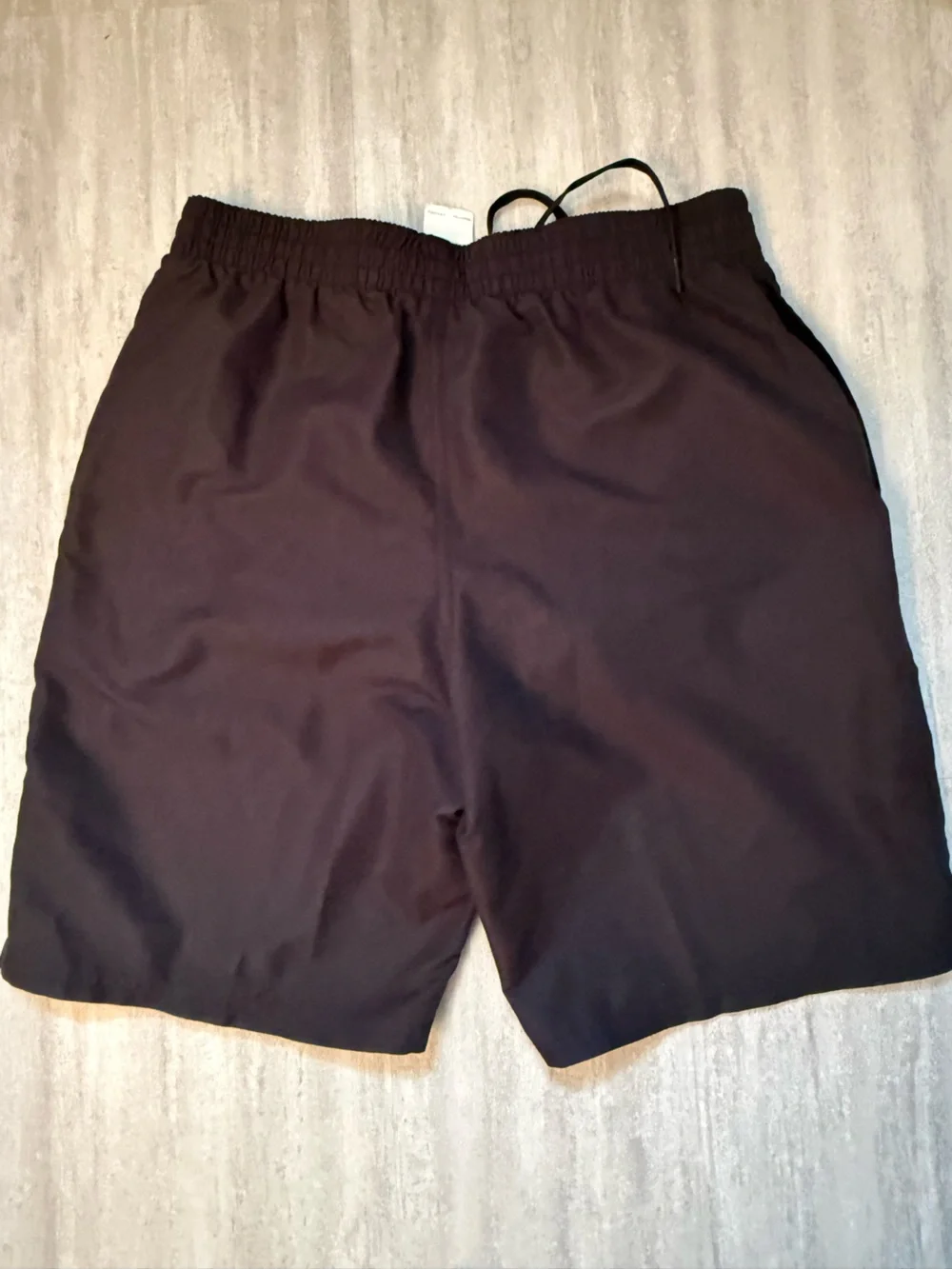 Nike men’s black swim trunks